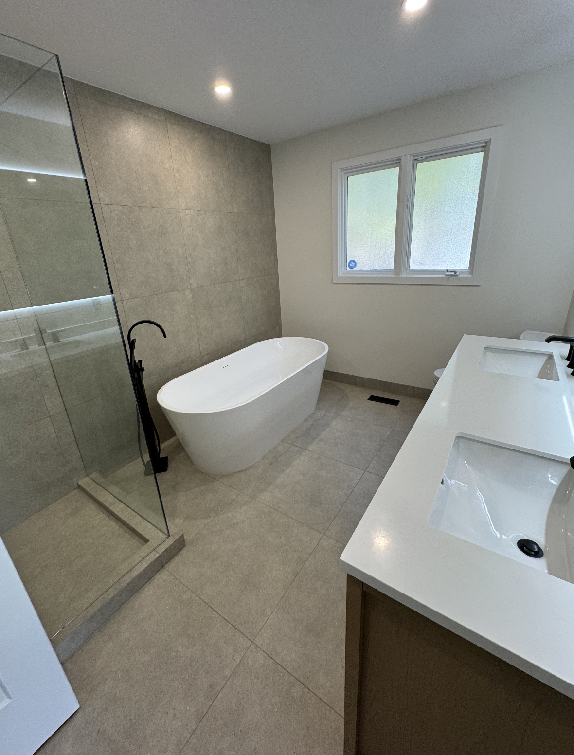 Completed bathroom renovation in Kelowna by CedarWolf Build + Design