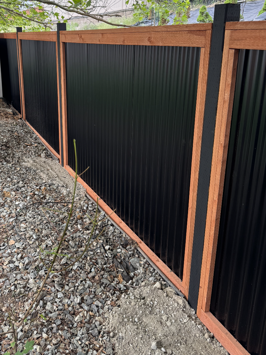Corrugated privacy fence in Kelowna by CedarWolf Build + Design
