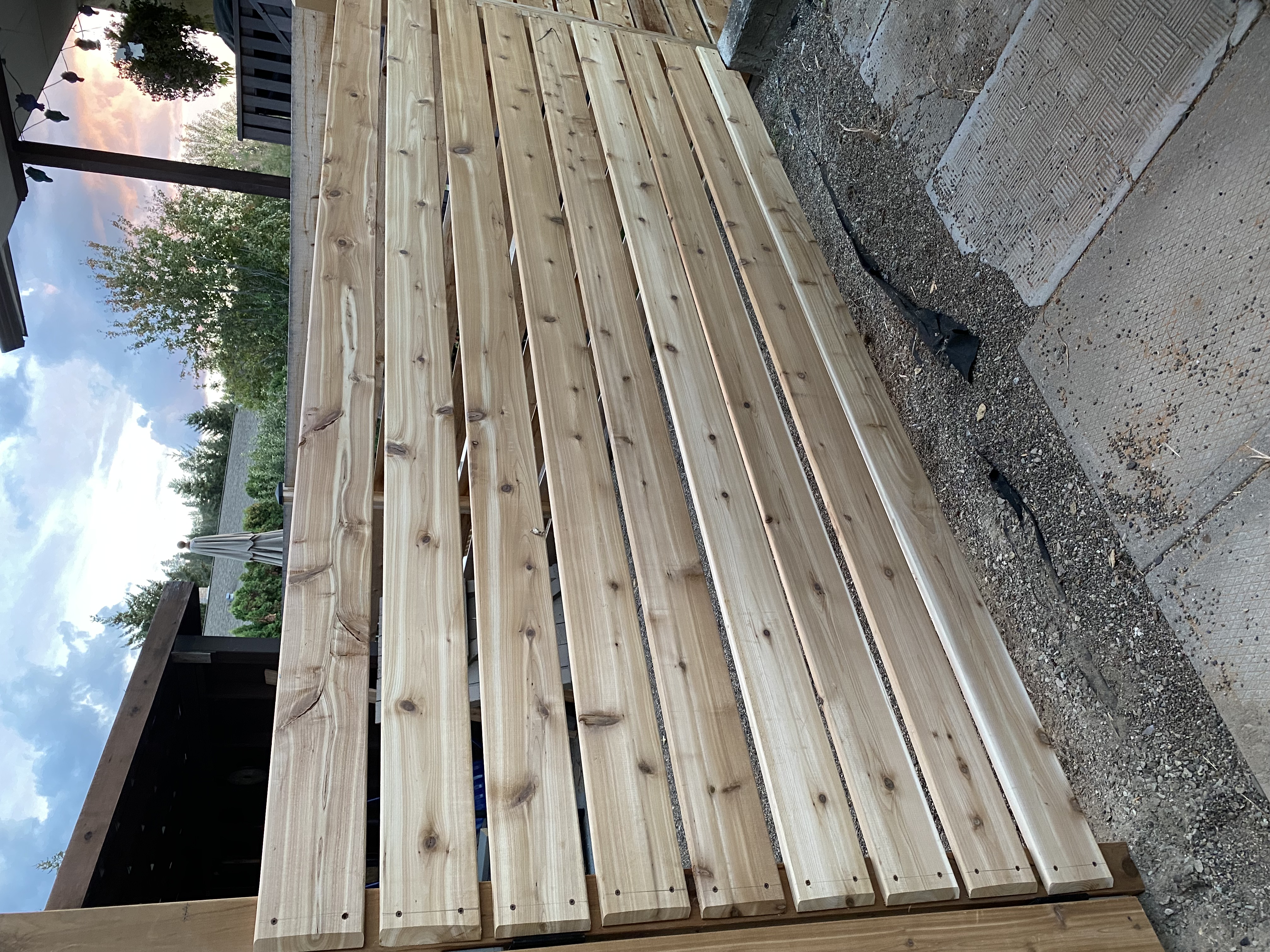 Horizontal board fence installation Kelowna